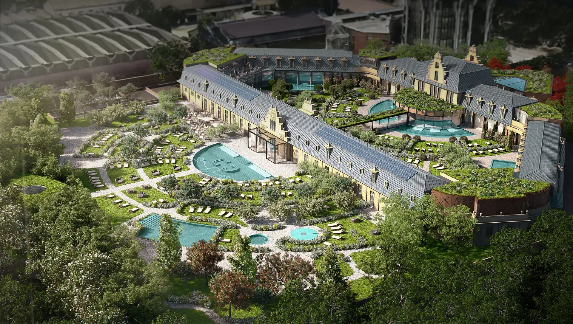 Vista aerea della spa DE MONTEL di Milano, con piscine, giardini e un lussuoso edificio