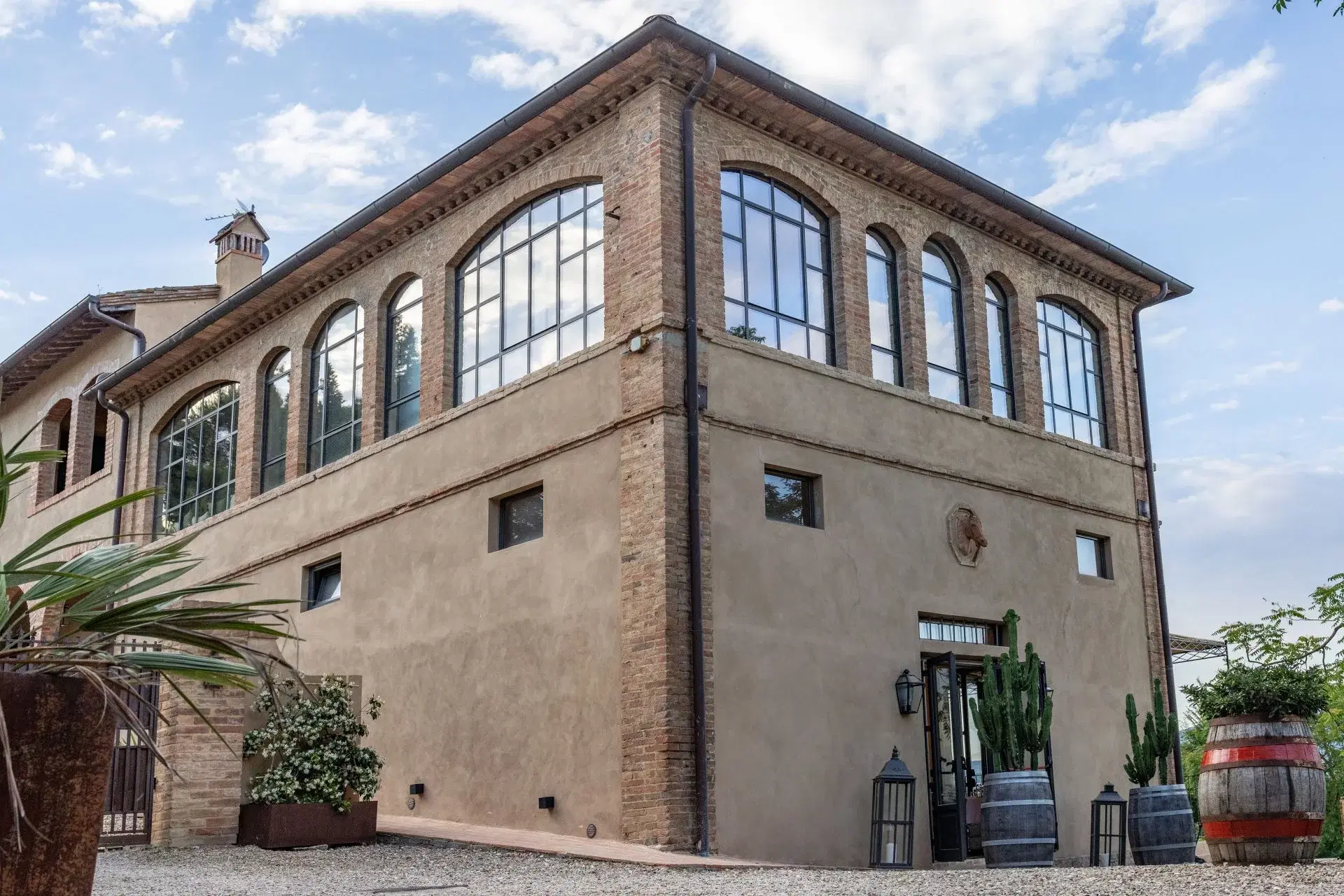 Camere nelle scuderie restaurate con vista vigneti