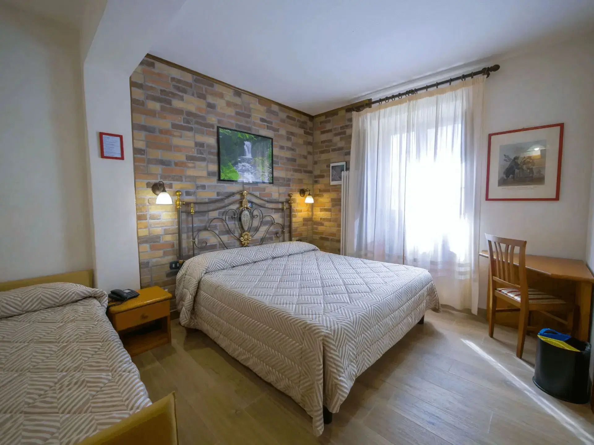 Stanza tripla con patio