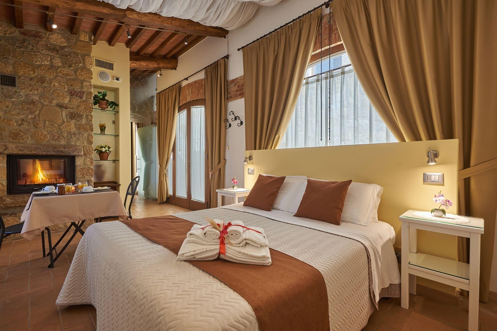 Camera Suite con bagno e camino