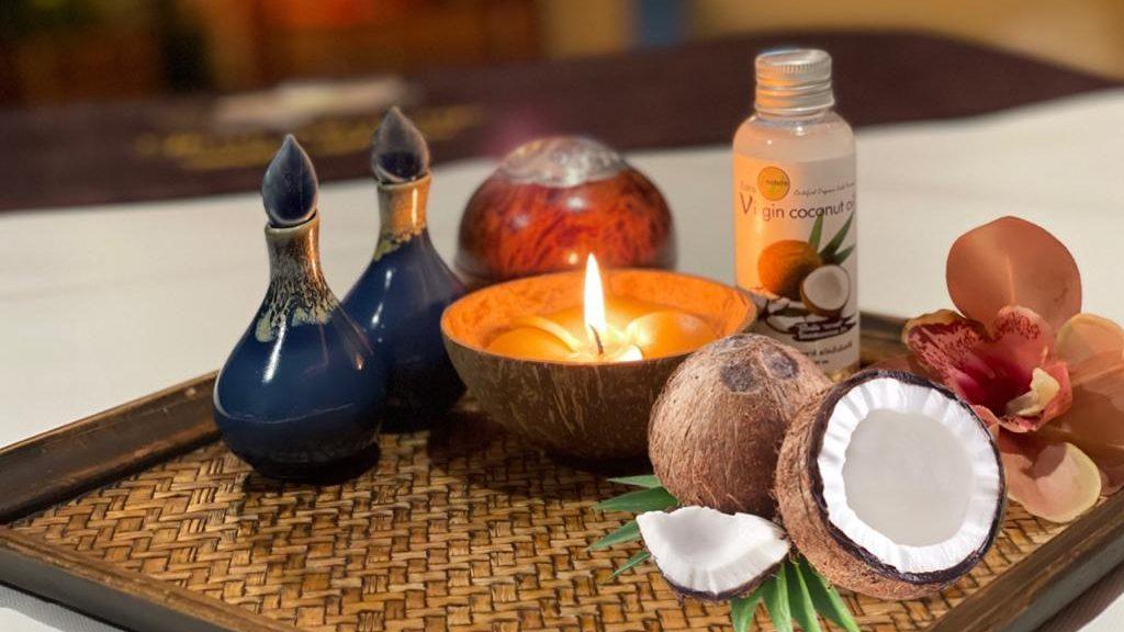 Massaggio con olio di cocco